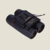 Compact black 30x60 binoculars with a foldable design and gold markings on the lens bridge.
